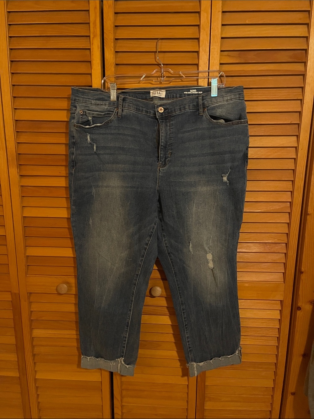 Nicole Miller Soho Distressed Cropped Jeans in Dark Blue